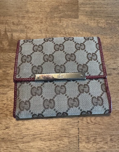 Portafoglio vintage Gucci bif in pelle con bordo rosso e tela GG