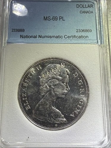 1965 Canada Silver Dollar NGC PL65 Small Beads Blunt 5. Melt Is $25.82 Currently