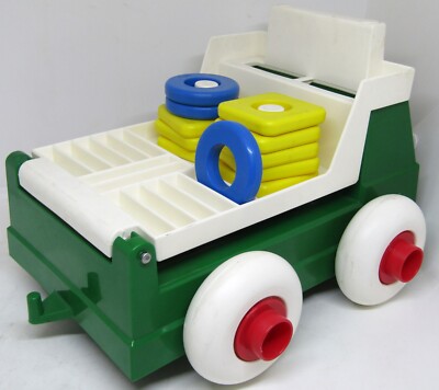 Johnson and Johnson Stack and Dump Lift Truck with 11 Pegs.