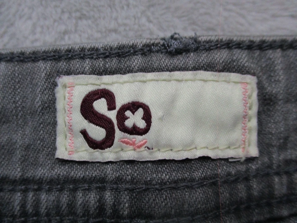 Pantalones de mezclilla elásticos con volantes y dobladillo tiro bajo 7 grises para mujer Foto 3 de 4