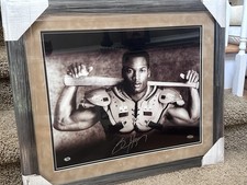 Bo Jackson Autographed Framed Poster w/ COA, Shoulder Pads, & Baseball Bat
