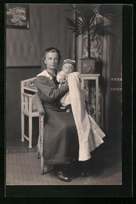 Mother holding her child in her arms, mother happiness, postcard 