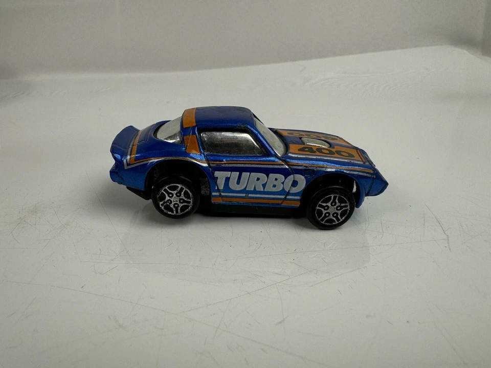 Buddy L Blue Pontiac Firebird Turbo Chargers 400 1981 coche de juguete 1:64 - MUY RARO Foto 2 de 4