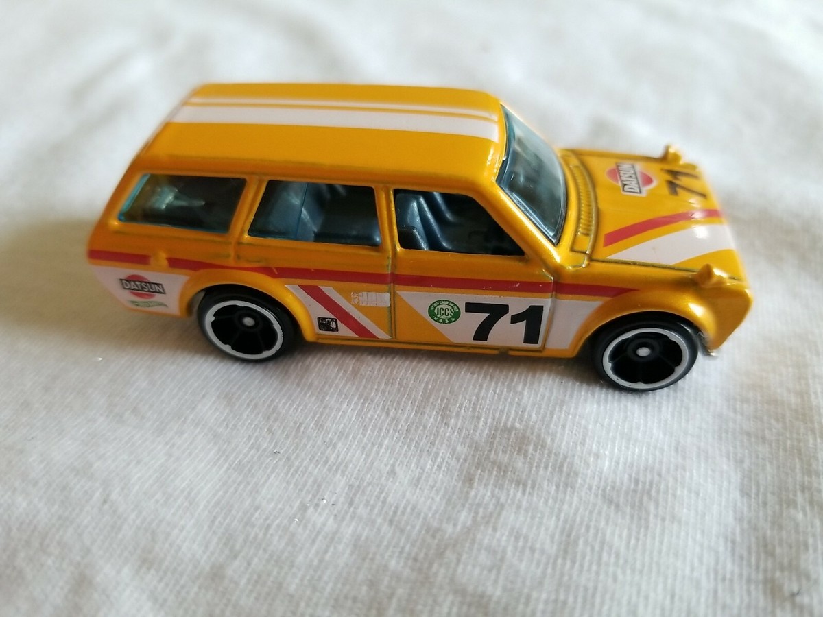 Hotwheels’71 DATSUN 510 WAGON yellow 2015 Hot Wheels 71 DATSUN BLUEBIRD 510 WAGON Yellow 202/250
