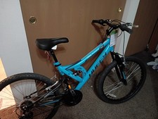 Teal, Huffy, mountain bike, wheel 24," for 4'6" to 5'6" height