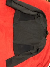 womens NIKE sweatshirt size small. Blue dark color with panels like net.