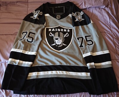 nfl team dressing in silver and black Raiders' rocking their icy hot white jerseys with the silver numbers  tonight in Denver! These are CLEAN! 