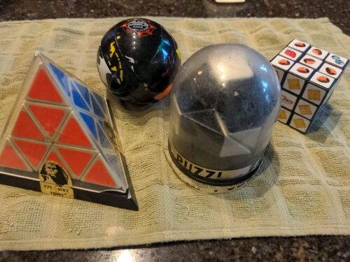 Vintage années 80 puzzle - paquet de quatre - Serpent, Pyraminx, Rubik's World, Chex Cube - Photo 1/11