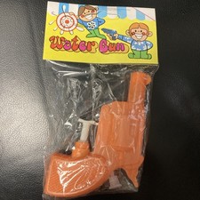 Vintage Small Revolver Water Gun Orange
