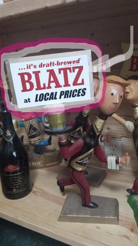 Vintage Blatz Beer Running Waiter Reproduction Sign "AT LOCAL PRICES"