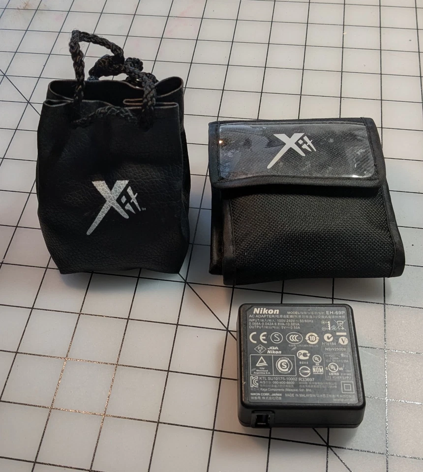 XIT Photo Lens Wallet/52 mm/4 Xit Close-up/ 1 Hoya Filter/1 Nikon EH-69P Charger - Image 2 of 4