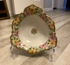Nippon Porcelain trinket dish. Hand Painted flowers with a gold touch. 