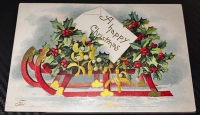 C 1910 POSTCARD Ellen Clapsaddle Christmas Sled with Mistletoe Red Ribbon UNUSED - image 1 of 2