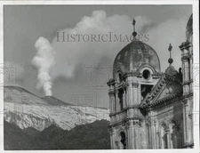 1961 Press Photo White smoke and steam curls upward from Mount Etna in Sicily.