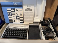 TI-99/4A TEXAS INSTRUMENTS HOME COMPUTER gaming 7 games  booklet, console, Cord