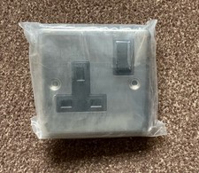 13A Switched Single Socket – Double Pole Black Insert Stainless Steel Brand New