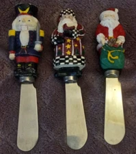 Lot of 3 Boston Warehouse Butter Cheese Knives Spreaders Santa and Nutcracker