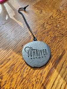 metal golf bag tag from Sunriver Resort