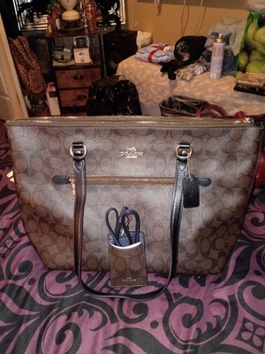 Brand new Coach Tote Large Brown & Black Tags still on the bag  from the coach