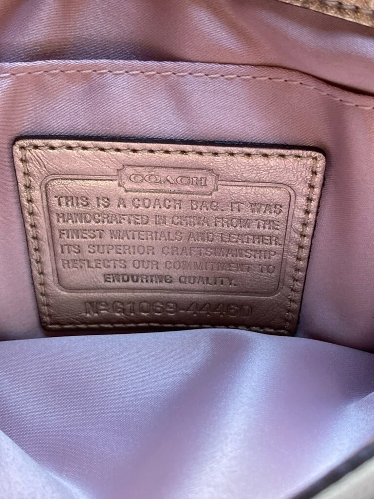 Borsa da polso Coach in pelletteria artigianale paillettes oro rosa nuova con etichette