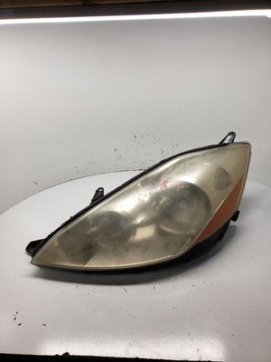 Used Left Headlight Assembly fits: 2006 Toyota Sienna L. halogen Left Grade A