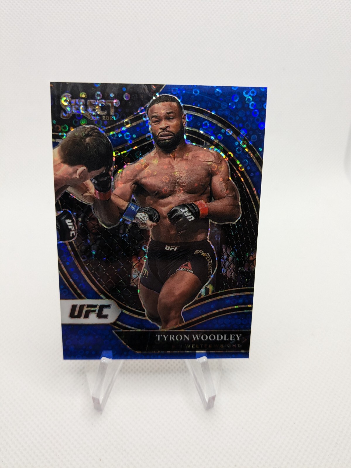 2021 Panini Select UFC Tyron Woodley Octagonside Blue Disco /99
