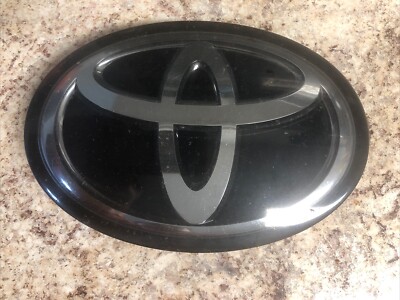 Used OEM Toyota Radar Emblem - Fits Prius, Avalon, Highlander, RAV4 Hybrid - 53141-47031 / 42020