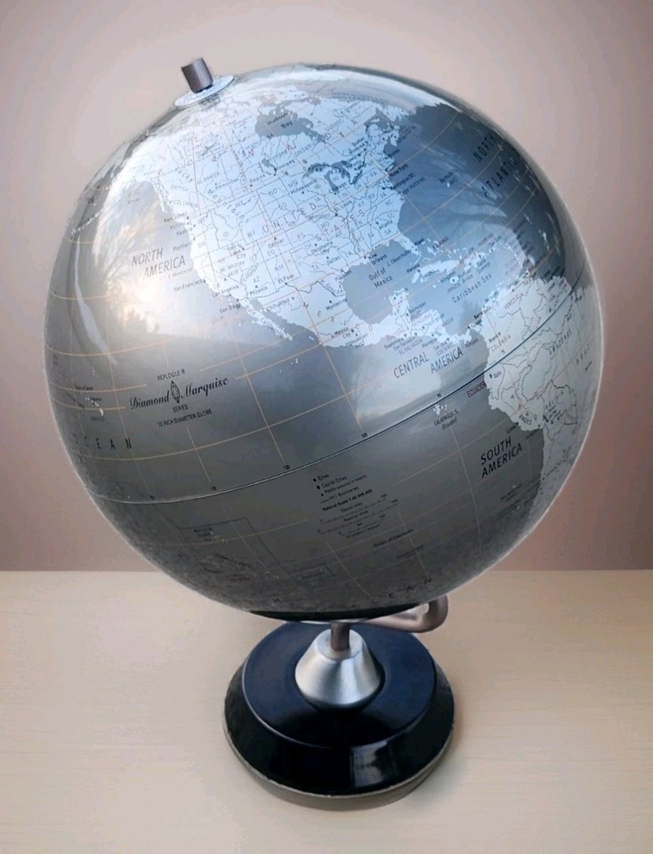 The Diamond Marquise Series globe is one of Replogle's most sculptural designs — a genuine MCM art object that looks like it belongs in a Kubrick film set.