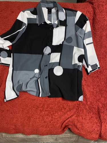 ali miles 1x plus size top