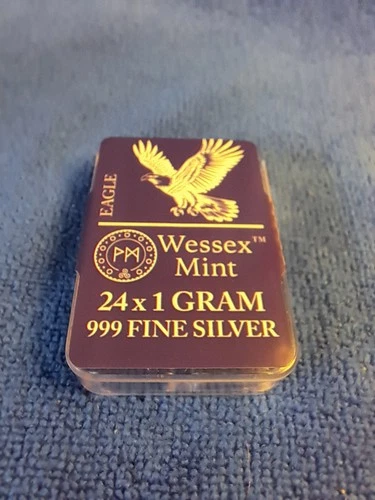 24 FINE SILVER INGOTS, BOXED&SEALED, EACH WEIGHING 1 GRAM .999 AG. EAGLE DESIGN.