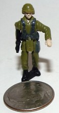 Very Small Bendable Figure of a Soldier with a Rifle in Olive Green 1