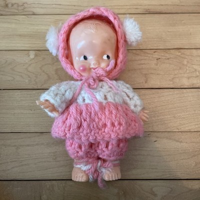 Vintage 1950's Irwin 6.5'' hard plastic toddler in pink hand crochet outfit