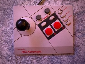 Nintendo NES with 12 games, 2 controllers, game pad, & zapper. Great condition!!