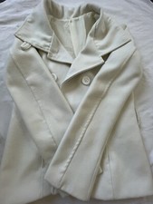 A White Used Women Jacket With A Beautiful Look