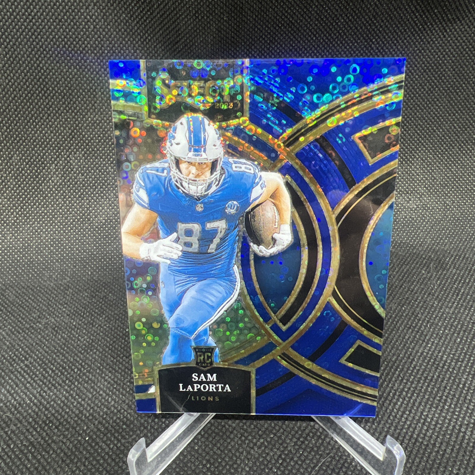 2023 Panini Select Premier Sam Laporta Blue Disco /25 #106 Lions Rookie