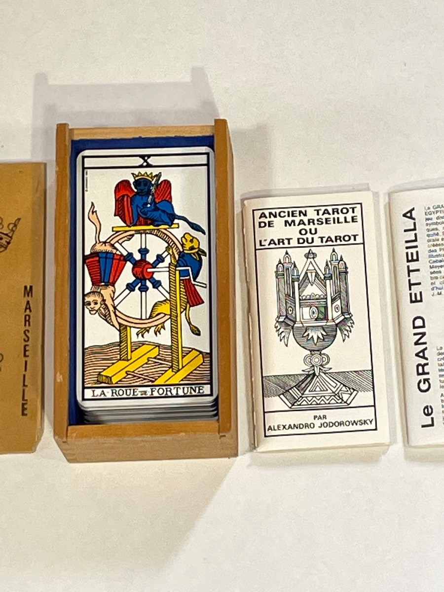 Box with 'Tarot de Marseille' cards and guidebook by