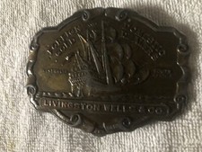 Vintage Foreign and Domestic Gold Dealers Livingston Wells Co Brass Belt Buckle