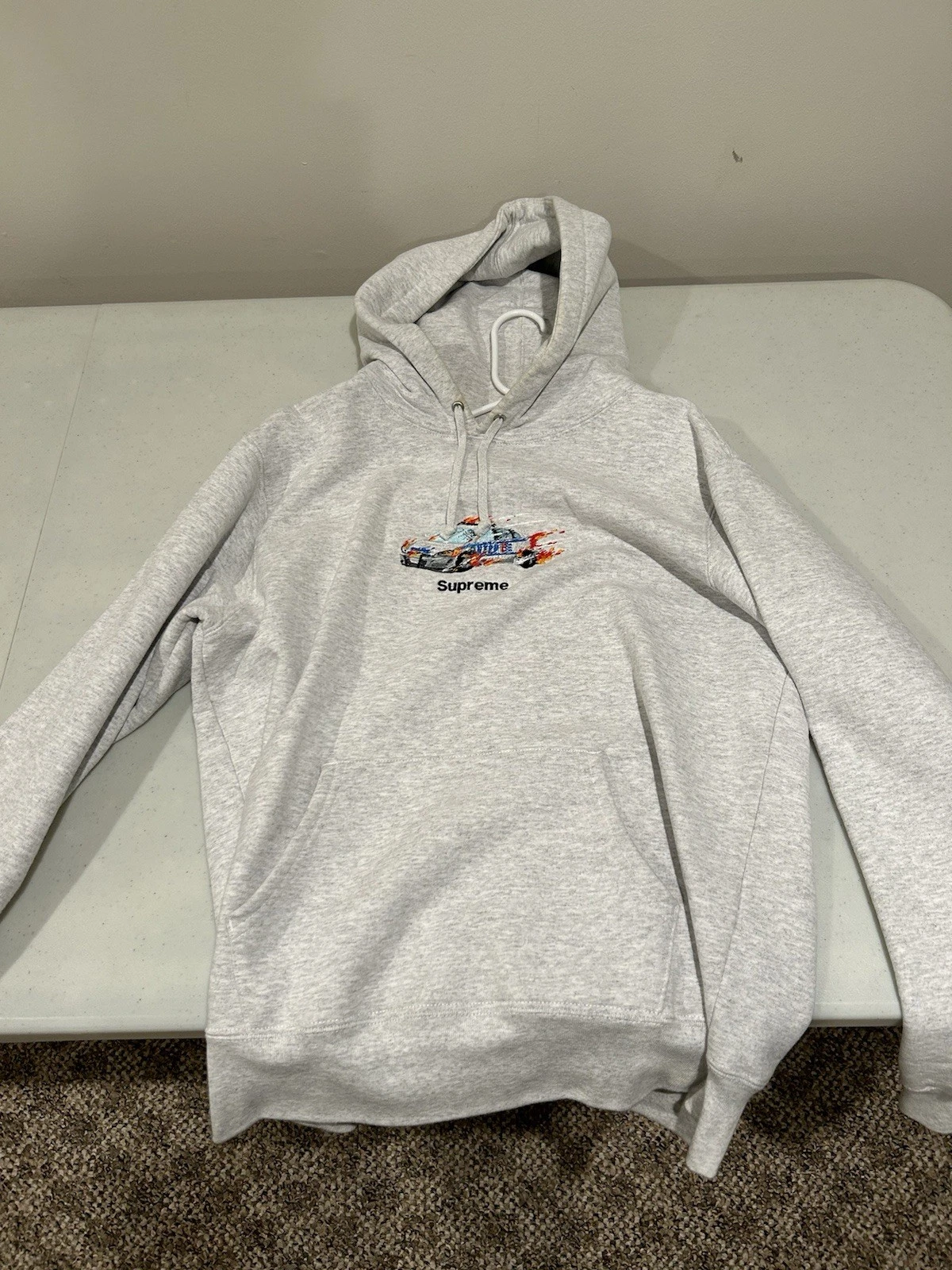 Supreme   Sweat à capuche Cop Car   Grand gris frêne/bruyère   OCCASION   Très bon état
