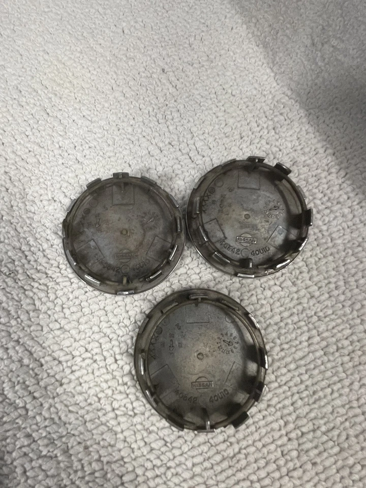 Tapacubos tapacubos Nissan Altima 1993-2001 OEM 4034240U10 cromado Foto 3 de 4