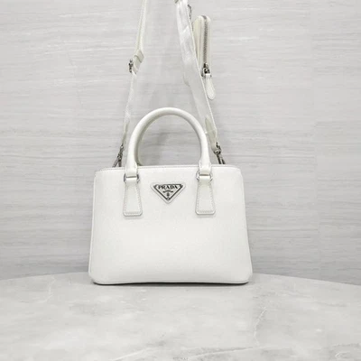 Prada Sac à bandoulière multipoches en Saffiano lux blanc 1BA296 158546059 [U] - Photo 1/4