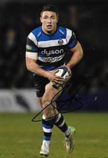 sam burgess runs with the ball for team bath during the match signed 12x8 photo