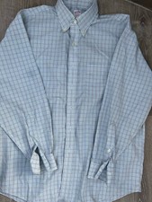Brooks brothers dress shirt 17-4/5. light blue in color with multiple stripes.