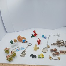 Vintage  junk drawer lot Necklace, Stamps, Figures , Keychains & more