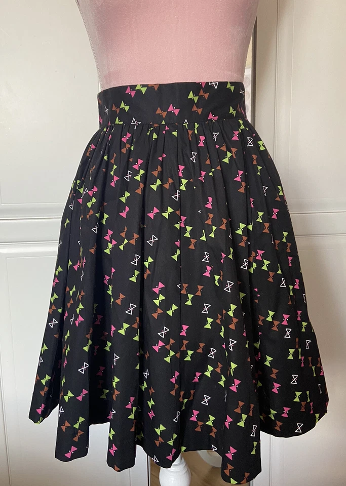 Falda completa Trashy Diva Candice Gwinn Reino Unido talla 8 EE. UU. 4 bolsillos negros hasta la rodilla Foto 2 de 4