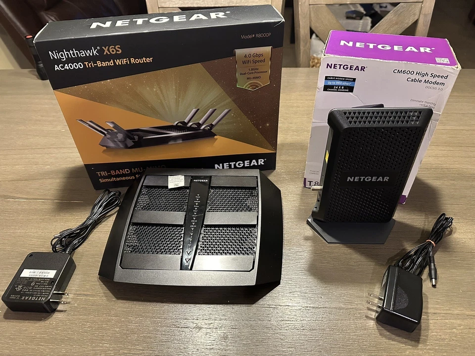 Módem de cable NETGEAR CM600-1AZNAS 960Mbps DOCSIS 3.0 y NETGEAR Nighthawk X6s Foto 2 de 4