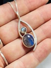 Modernist silver and good grade labradorites pendant with 16 inches chain