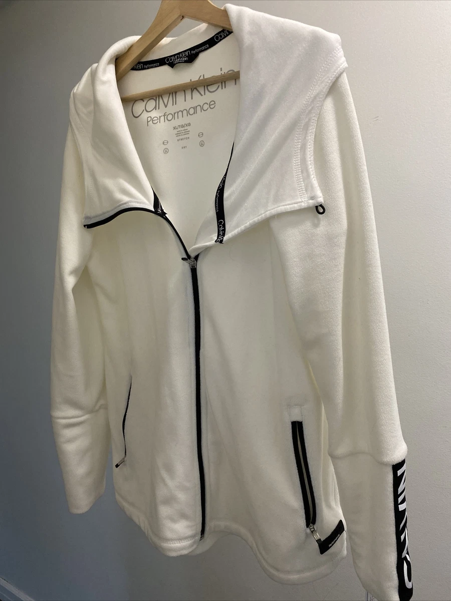 Calvin klein coat shop tag on sleeve