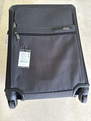 New Tumi Short Trip Expandable   4 Wheel 26'' Suit Case. $1050.