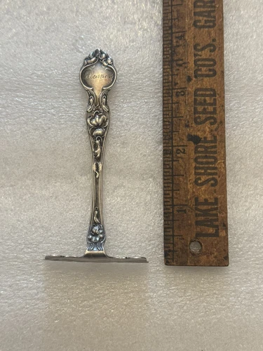 R Wallace & Sons Violet Pattern 1904 Sterling Silver Baby Food Pusher “Eleanor”