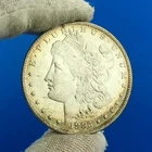 1883 O Morgan Silver Dollar $1 Better Rare Key New Orleans Mint Coin BU Toning